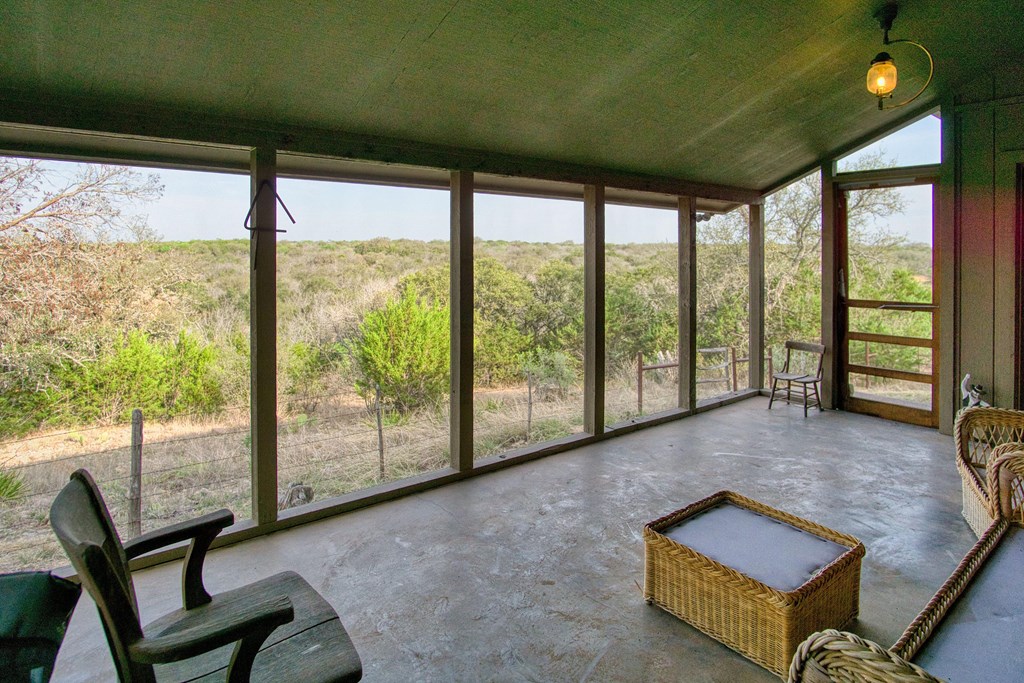 7461 Triplet Mill Road Mason, TX 76856 - Photo 36 of 46 a living room with furniture and a large window