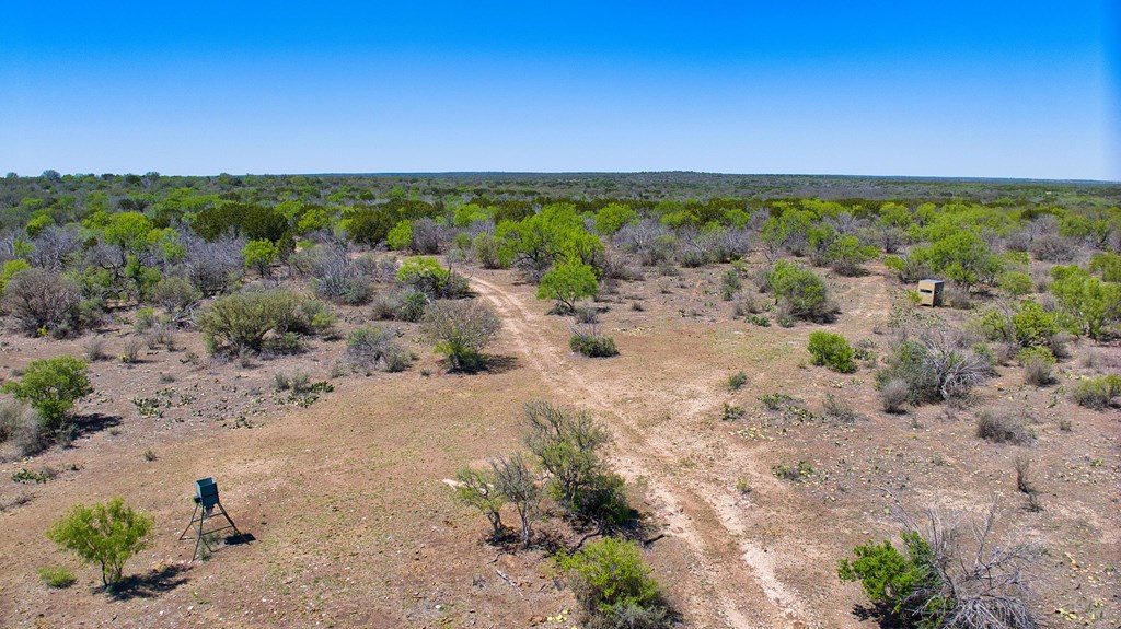 7461 Triplet Mill Road Mason, TX 76856 - Photo 40 of 46 a view of a beach with a field