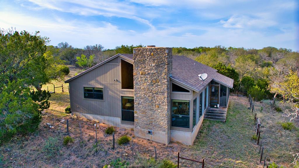 7461 Triplet Mill Road Mason, TX 76856 - Photo 6 of 46 a view of a house with a yard