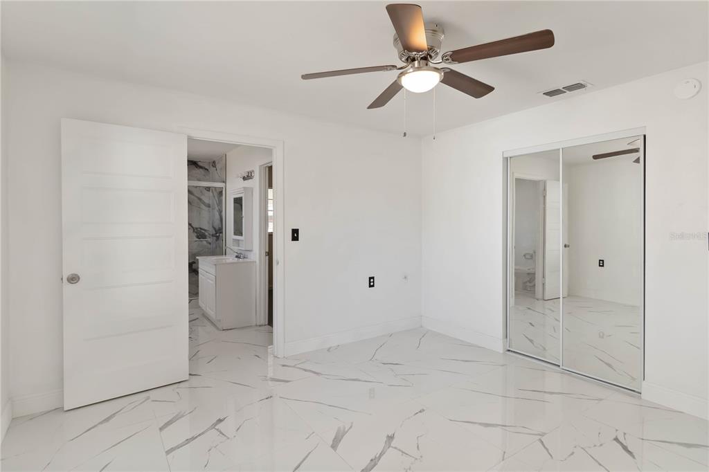 114 Palencia Road Auburndale, FL 33823 - Photo 21 of 27 wooden floor in an empty room