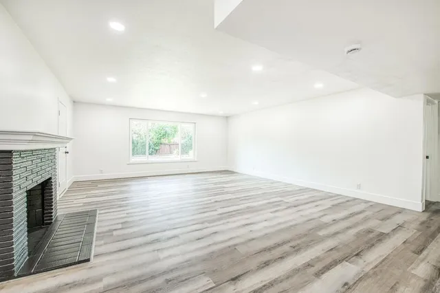 a bathroom with a shower and a sink