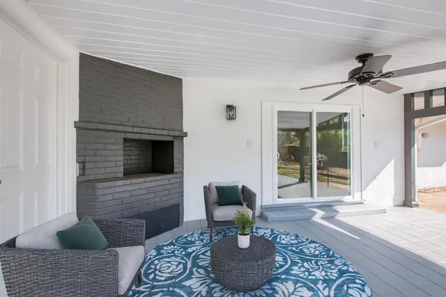 a view of a swimming pool with a porch