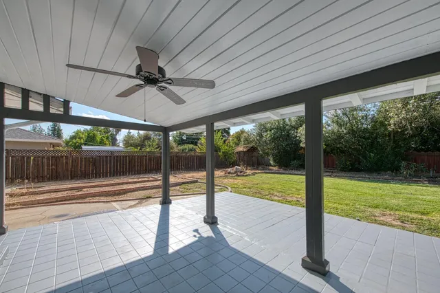 a view of swimming pool with seating space