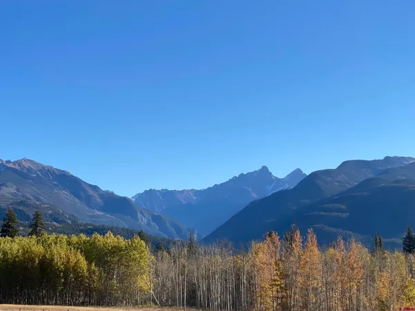a view of a lake with mountains in the background