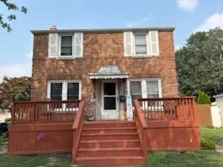 a front view of a house with a porch