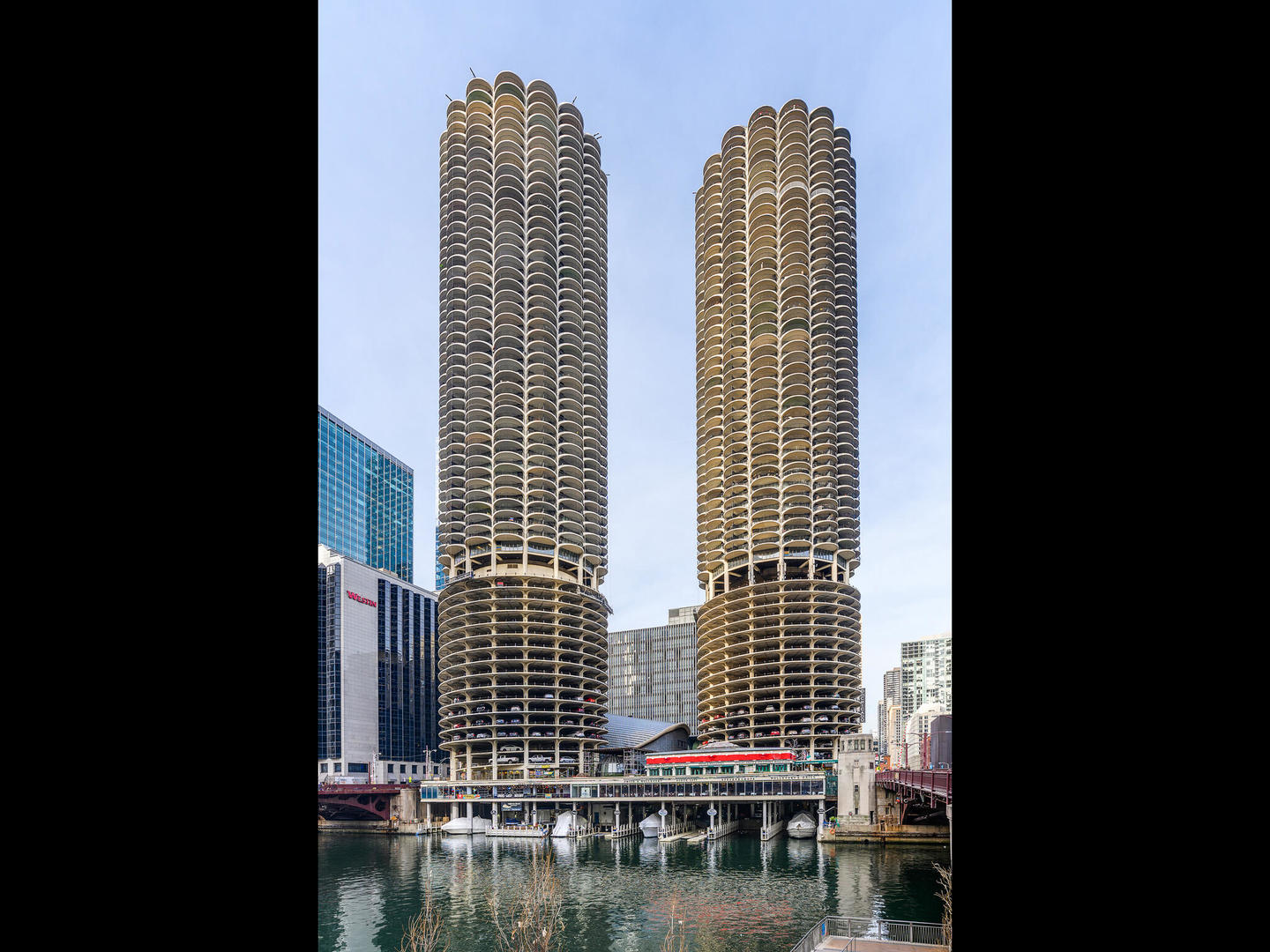 a view of balcony with two large windows