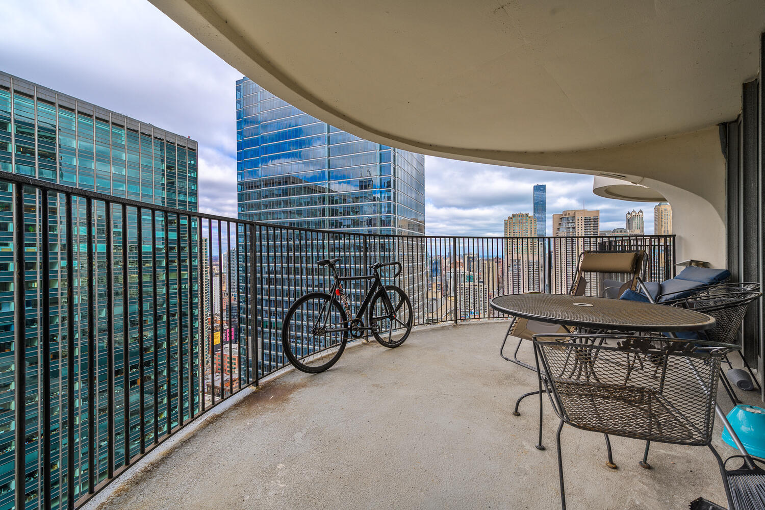 300 North State Street, Unit 4303 Chicago, IL 60654 - Photo 12 of 15 a view of balcony with furniture