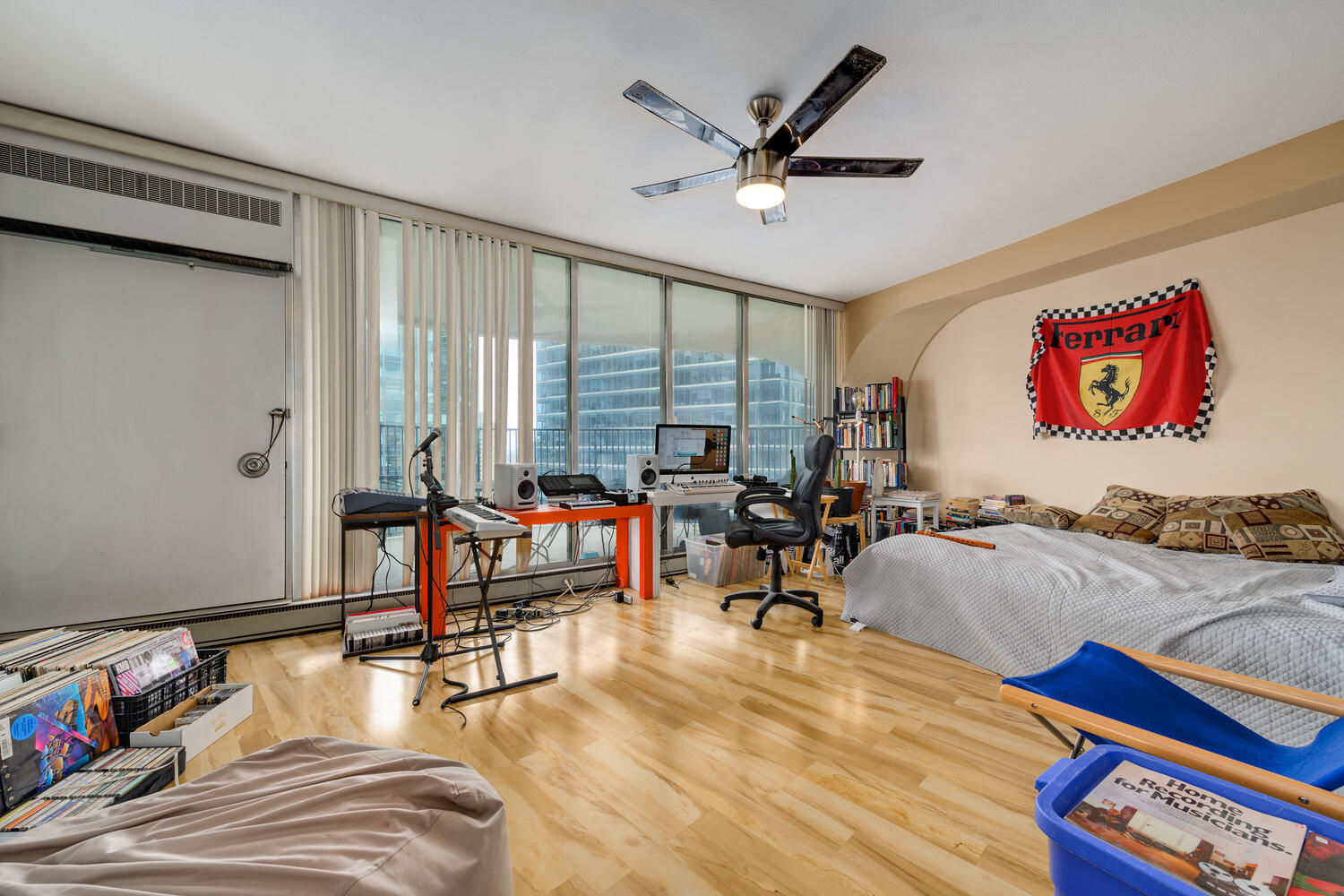 300 North State Street, Unit 4303 Chicago, IL 60654 - Photo 7 of 15 a living room with furniture and a large window