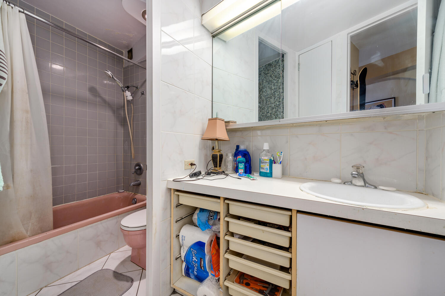 300 North State Street, Unit 4303 Chicago, IL 60654 - Photo 9 of 15 a bathroom with a sink and a mirror