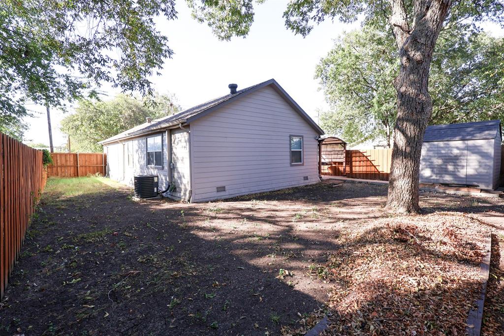 605 East Graham Street McKinney, TX 75069 - Photo 16 of 22 a view of a house with a yard