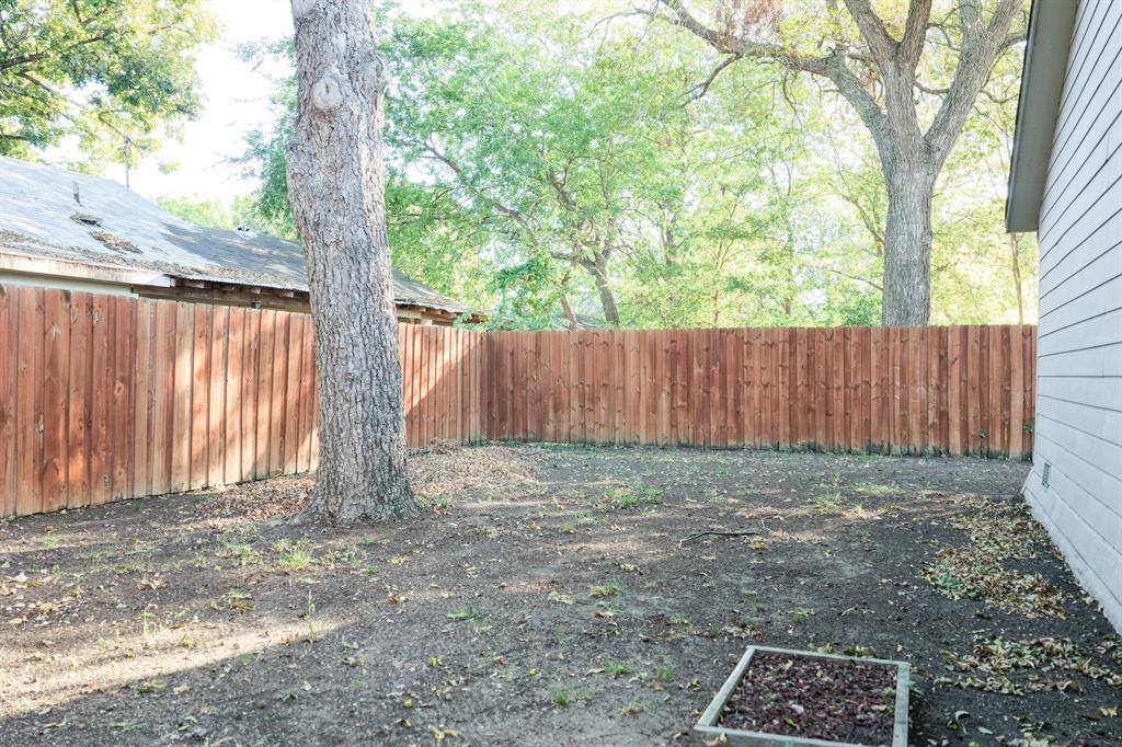 605 East Graham Street McKinney, TX 75069 - Photo 18 of 22 a view of outdoor space with wooden fence