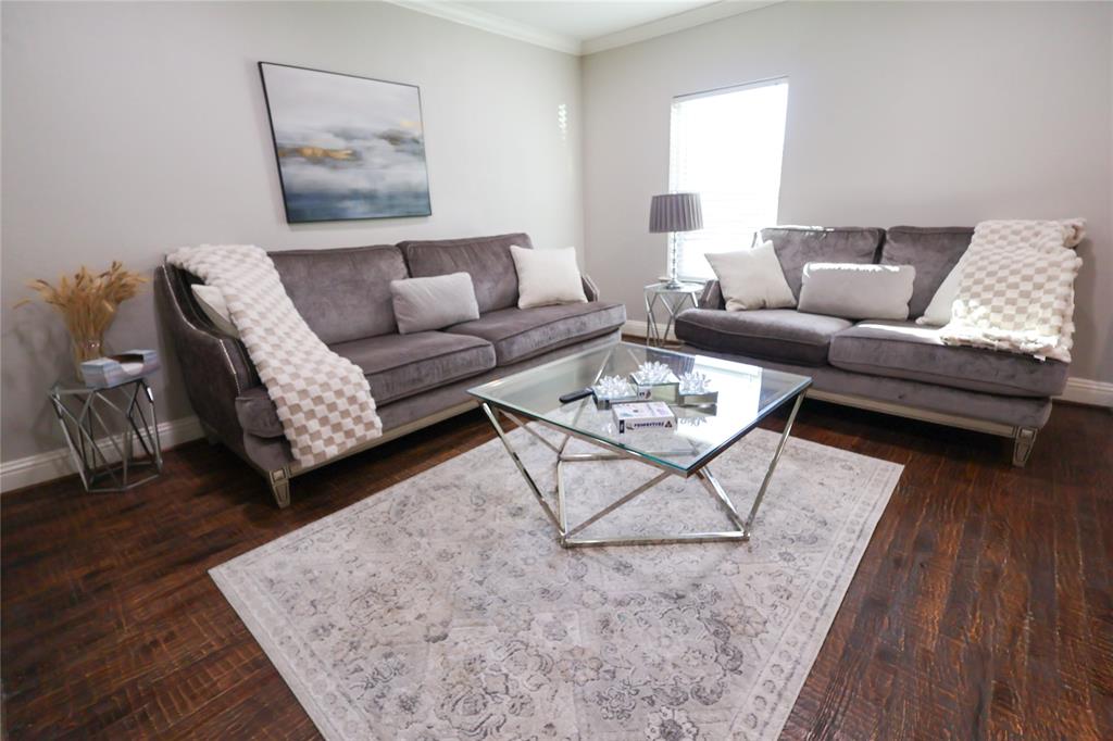 605 East Graham Street McKinney, TX 75069 - Photo 4 of 22 a living room with furniture and wooden floor