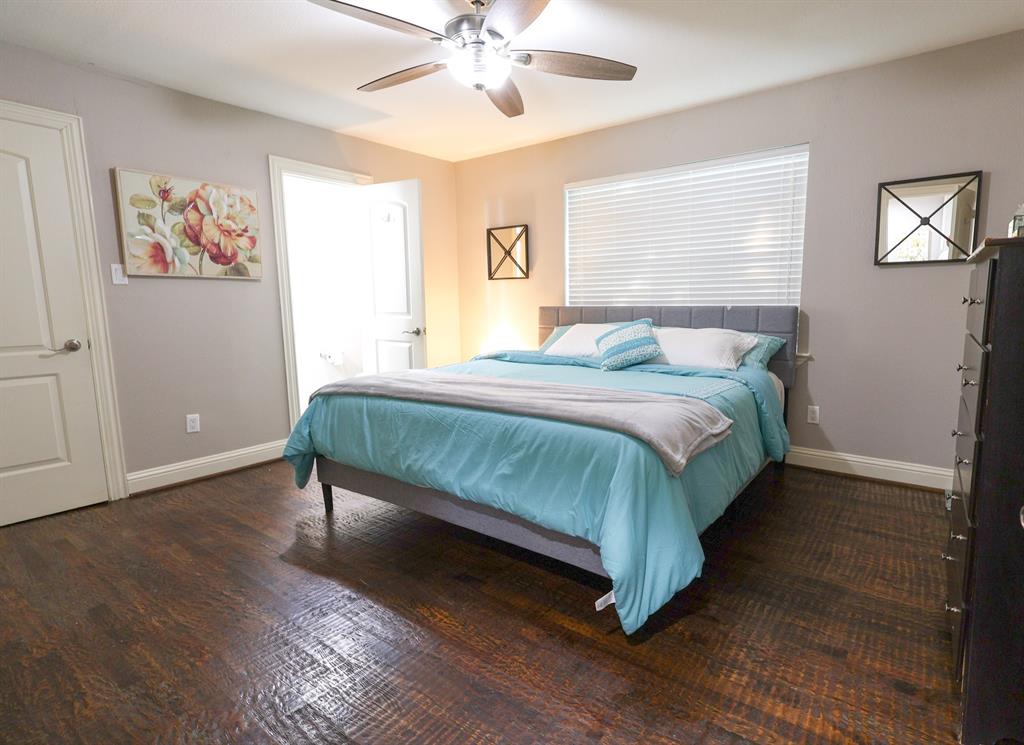605 East Graham Street McKinney, TX 75069 - Photo 10 of 22 a bedroom with a bed and window
