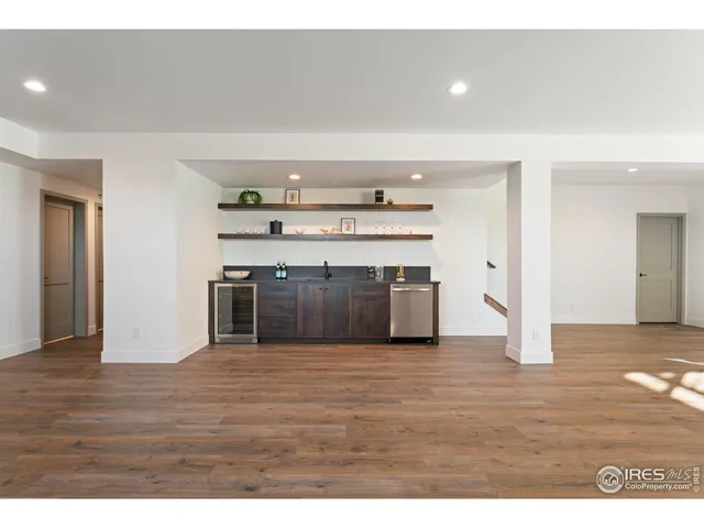 a view of a kitchen with a sink and a stove