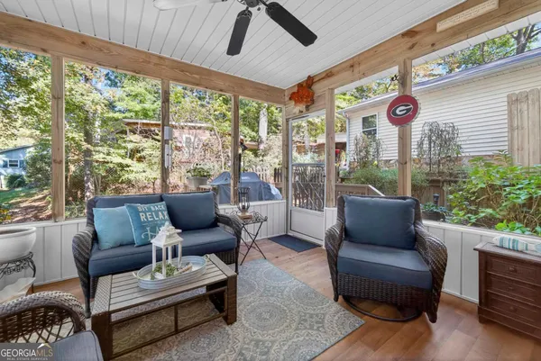 a outdoor living space with furniture and garden view