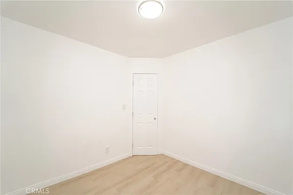 a view of small space with wooden floor