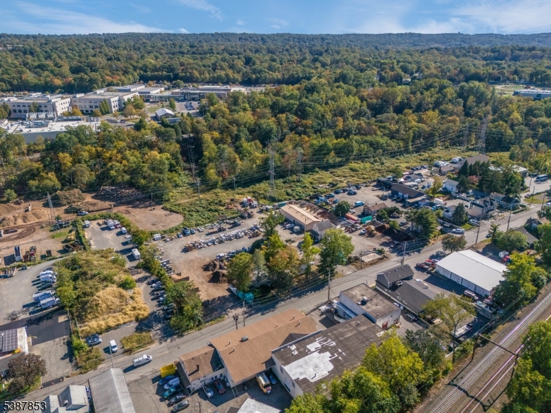 55 River Road Chatham, NJ 07928 - Photo 15 of 20 an aerial view of residential houses with outdoor space