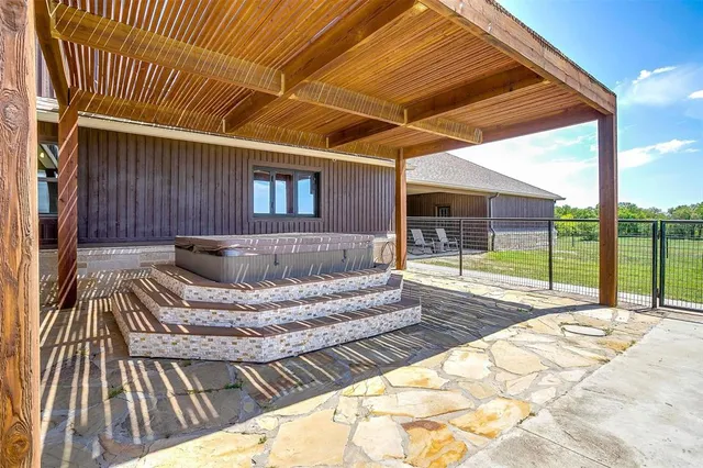 a view of swimming pool with seating space