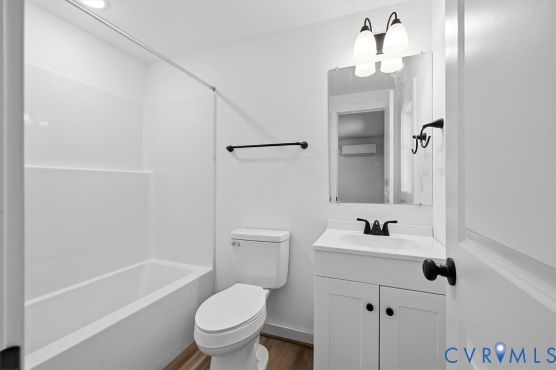15221 Wright Road Amelia Court House, VA 23002 - Photo 19 of 22 Contemporary bathroom featuring a white vanity wit