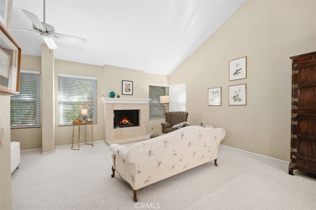 32 Colonial Irvine, CA 92620 - Photo 16 of 33 a living room with furniture and a fireplace