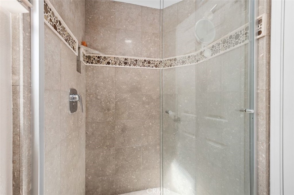 32 Colonial Irvine, CA 92620 - Photo 28 of 33 a bathroom with a shower