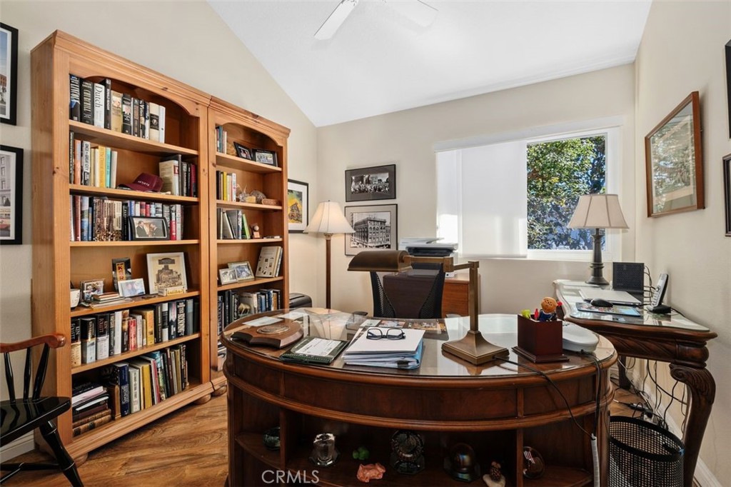 32 Colonial Irvine, CA 92620 - Photo 30 of 33 a living room with furniture and a book shelf