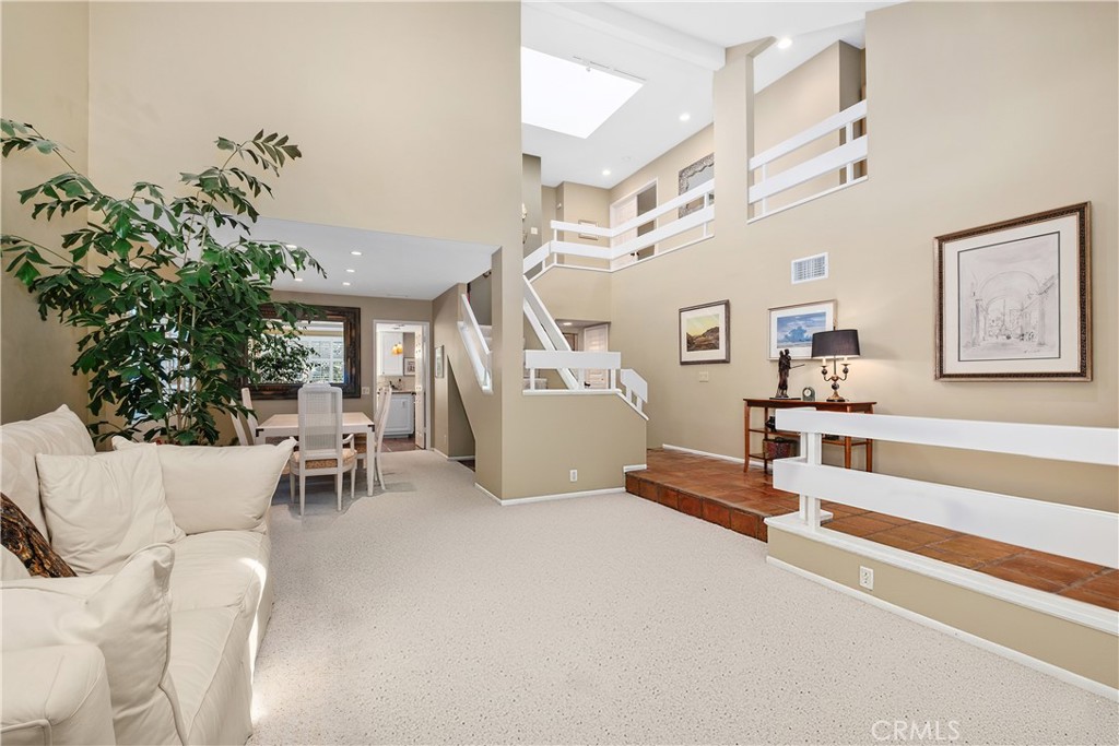 32 Colonial Irvine, CA 92620 - Photo 5 of 33 a living room with furniture and a potted plant
