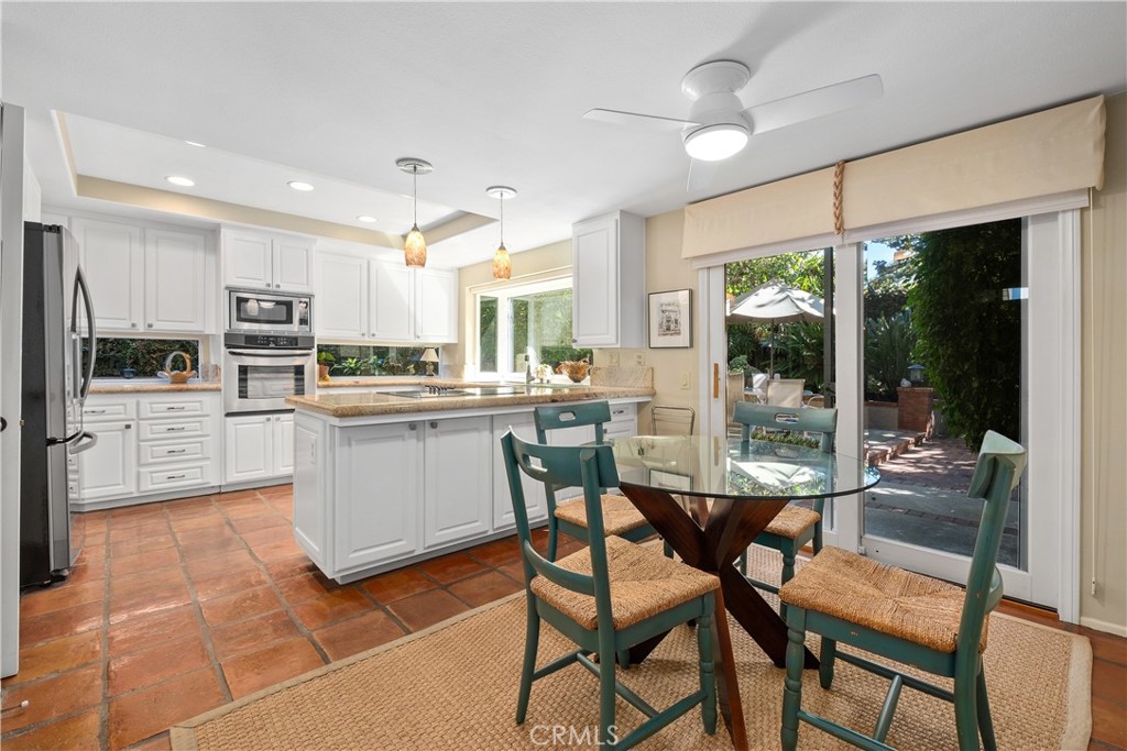 32 Colonial Irvine, CA 92620 - Photo 7 of 33 a view of a dining room kitchen and windows