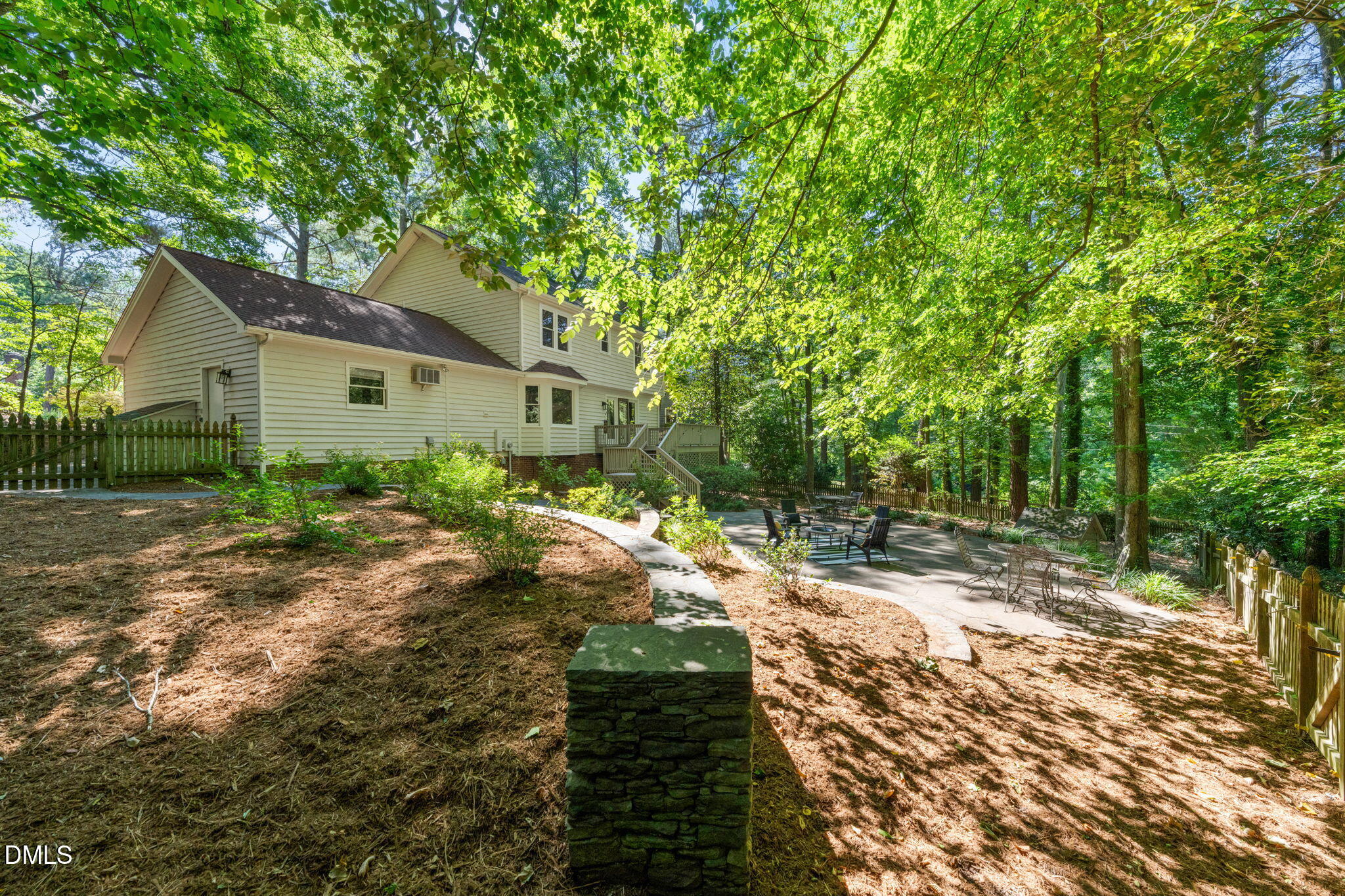 18 Strawberry Ridge Lane Durham, NC 27713 - Photo 48 of 59 a house with a tree in front of it
