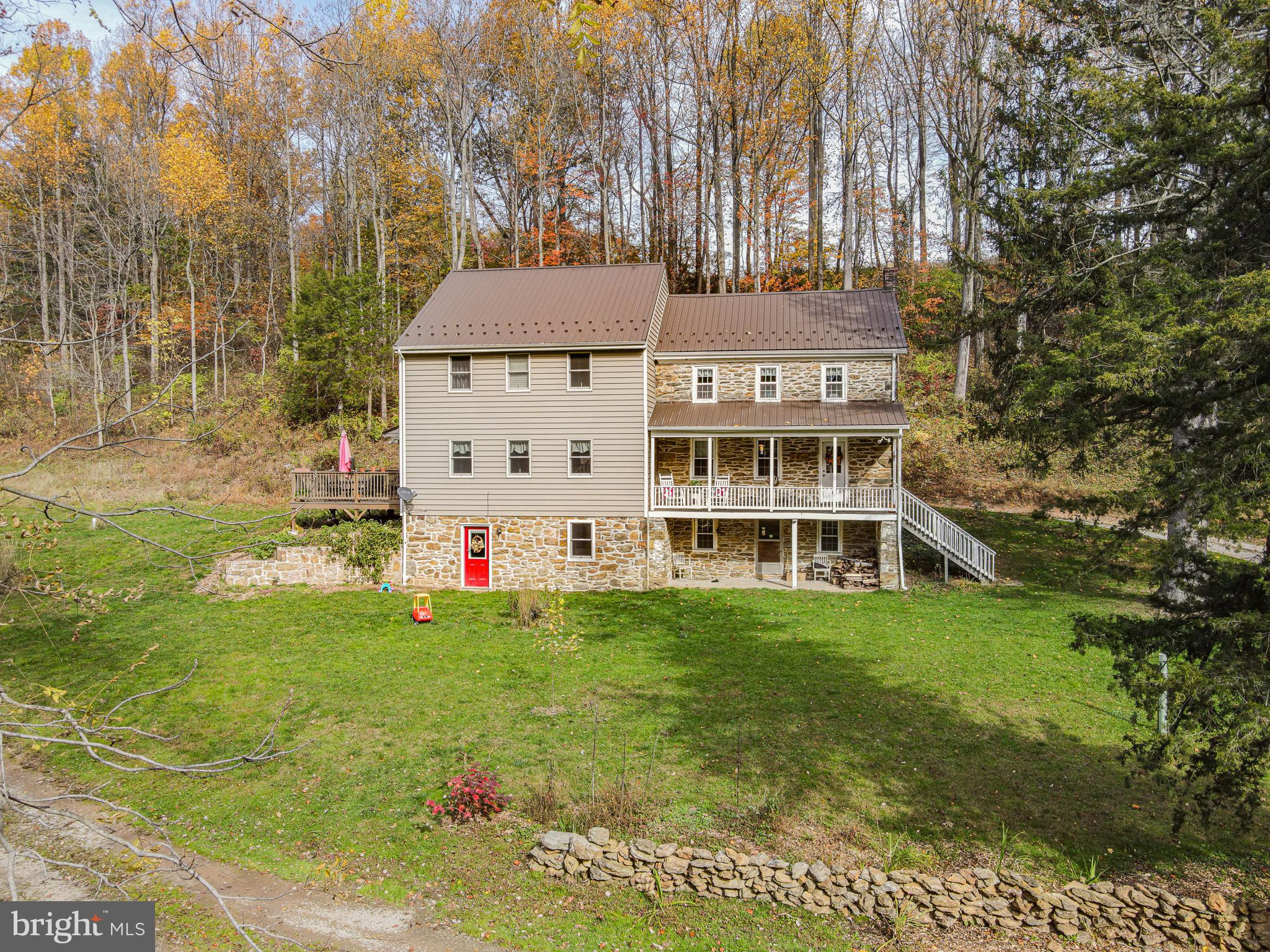988 Kratz Road Glen Rock, PA 17327 - Photo 12 of 97 a view of a white house with a yard