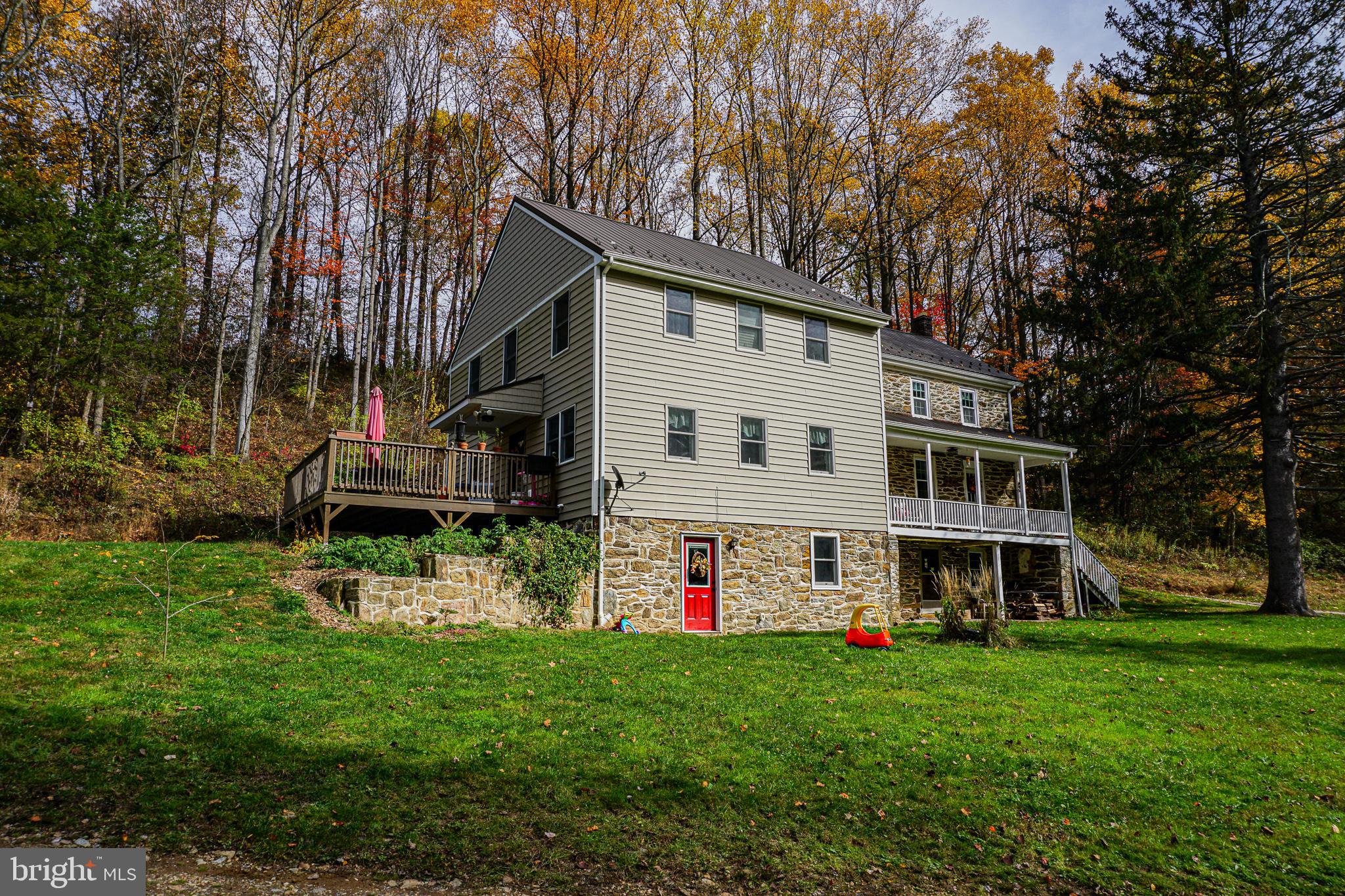 988 Kratz Road Glen Rock, PA 17327 - Photo 14 of 97 a view of a house with a big yard plants and large trees