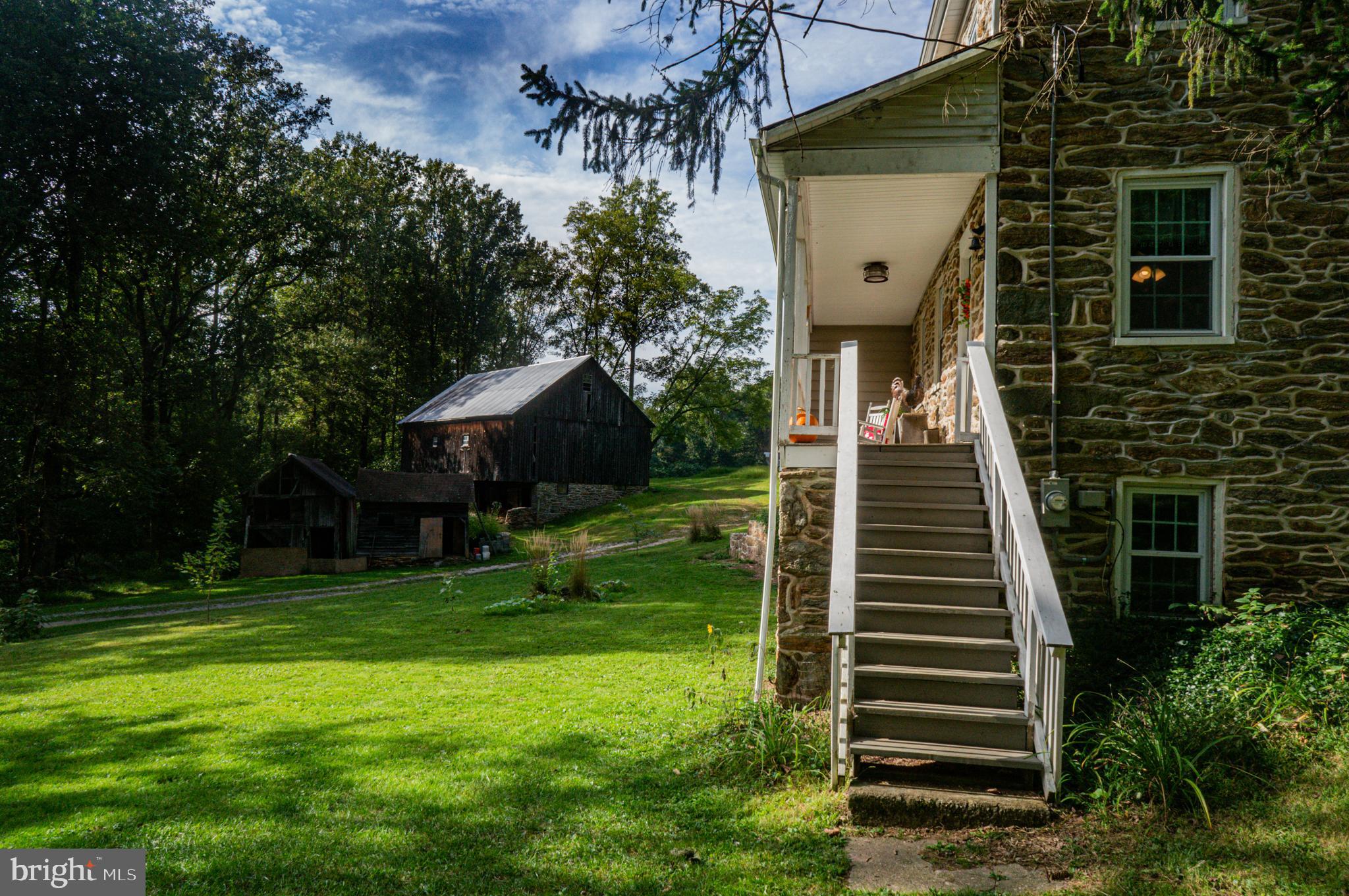 988 Kratz Road Glen Rock, PA 17327 - Photo 23 of 97 a front view of a house with a yard