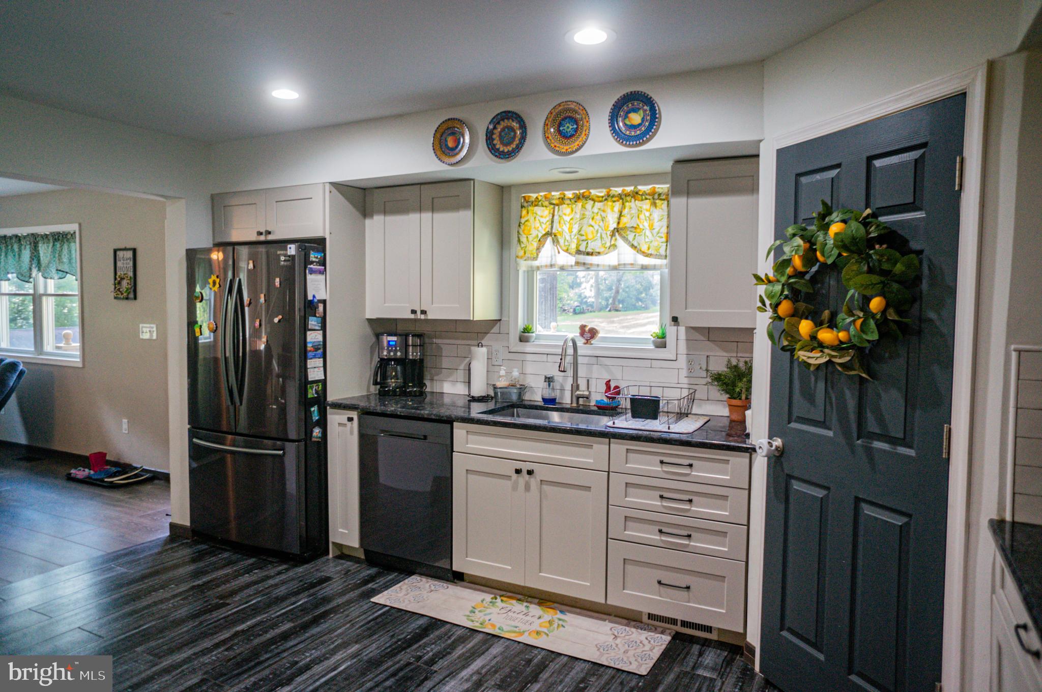 988 Kratz Road Glen Rock, PA 17327 - Photo 38 of 97 a kitchen with a refrigerator and a window