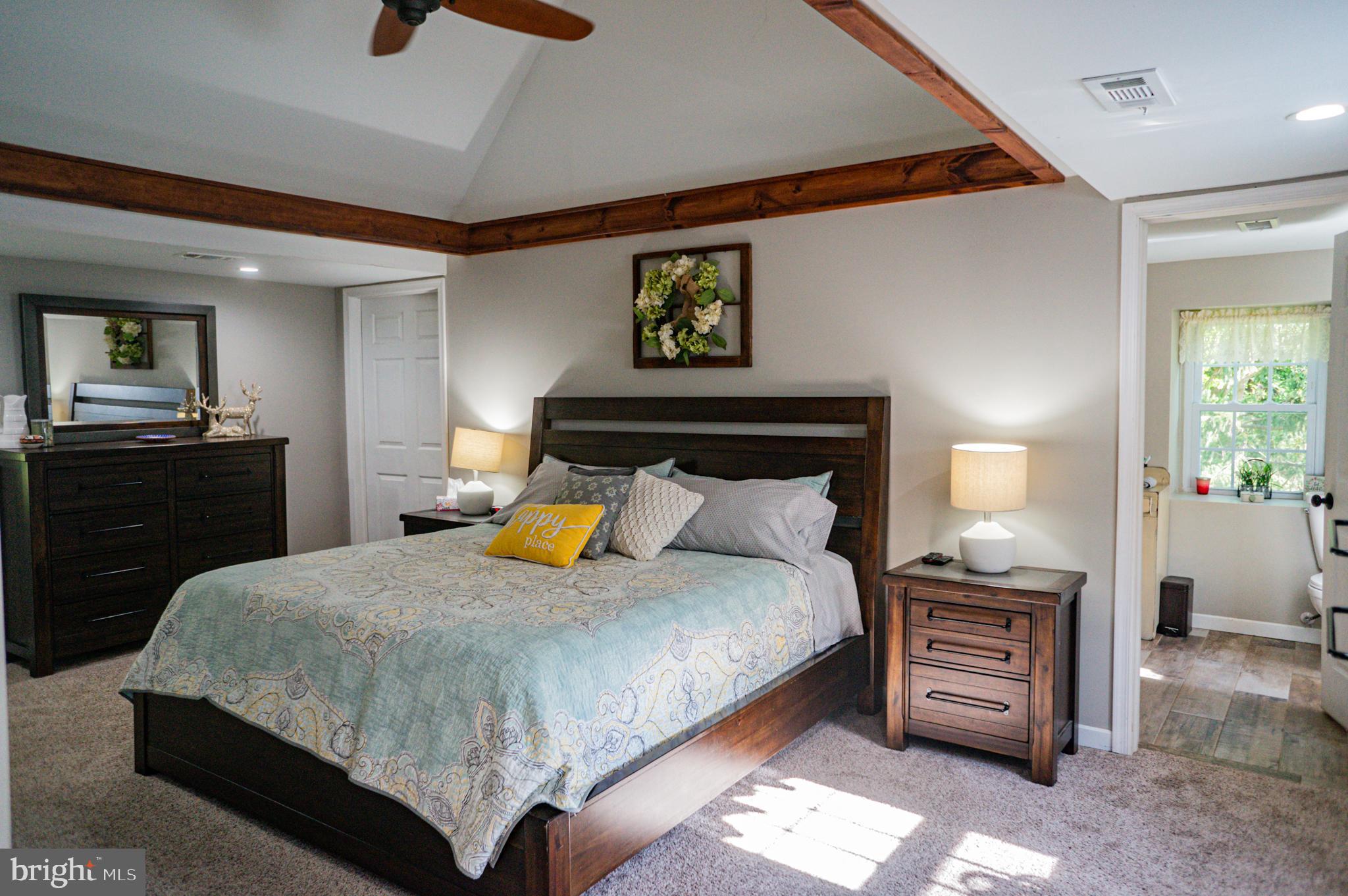 988 Kratz Road Glen Rock, PA 17327 - Photo 49 of 97 a bedroom with a bed and furniture