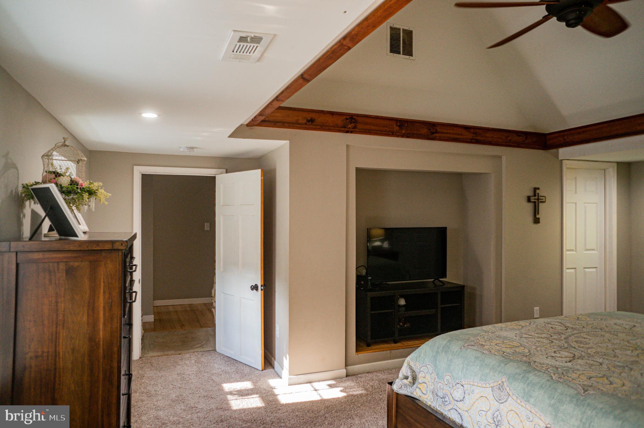 988 Kratz Road Glen Rock, PA 17327 - Photo 52 of 97 a bedroom with a bed and a bathroom