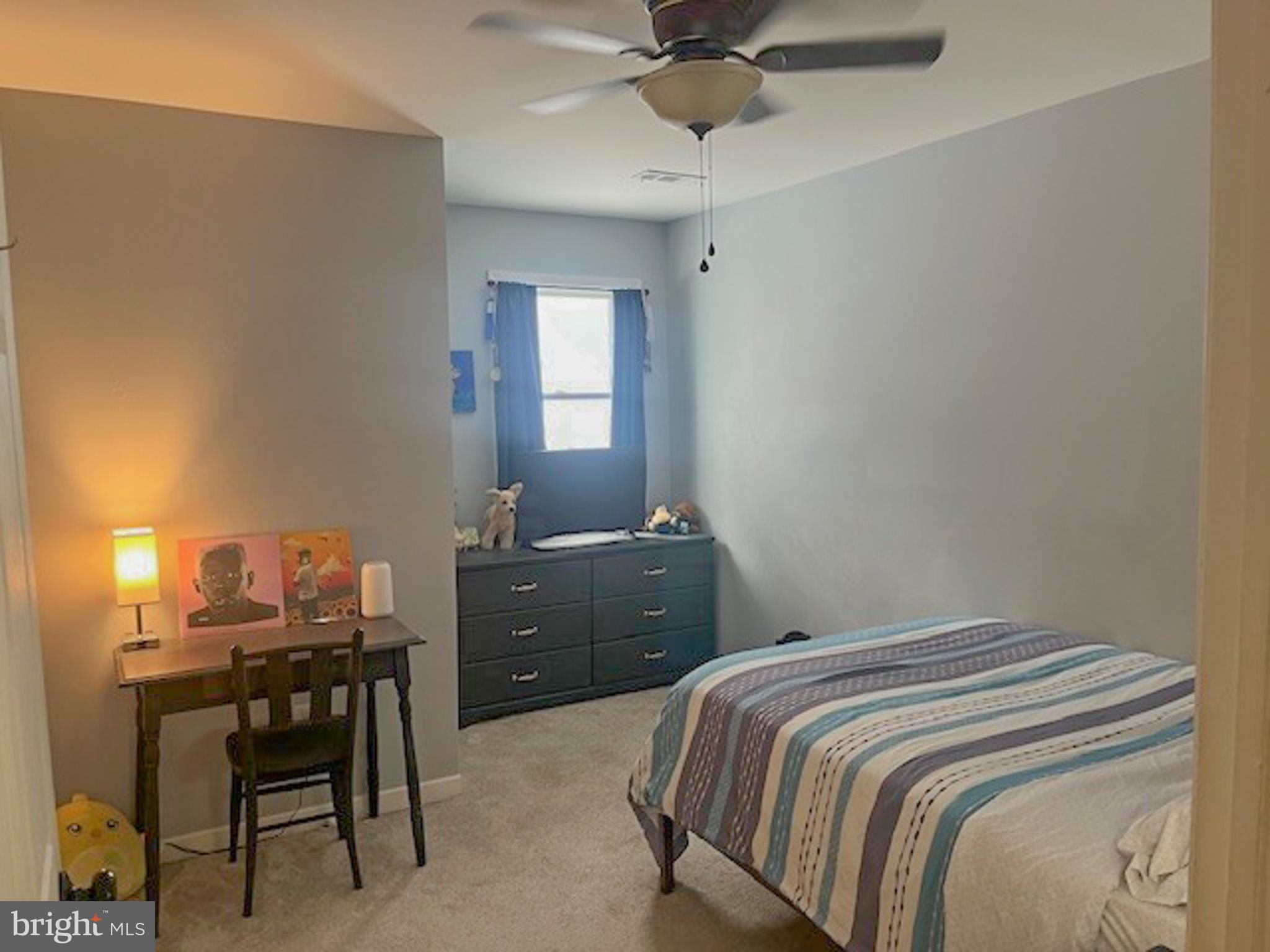 988 Kratz Road Glen Rock, PA 17327 - Photo 57 of 97 a bedroom with a bed and a desk