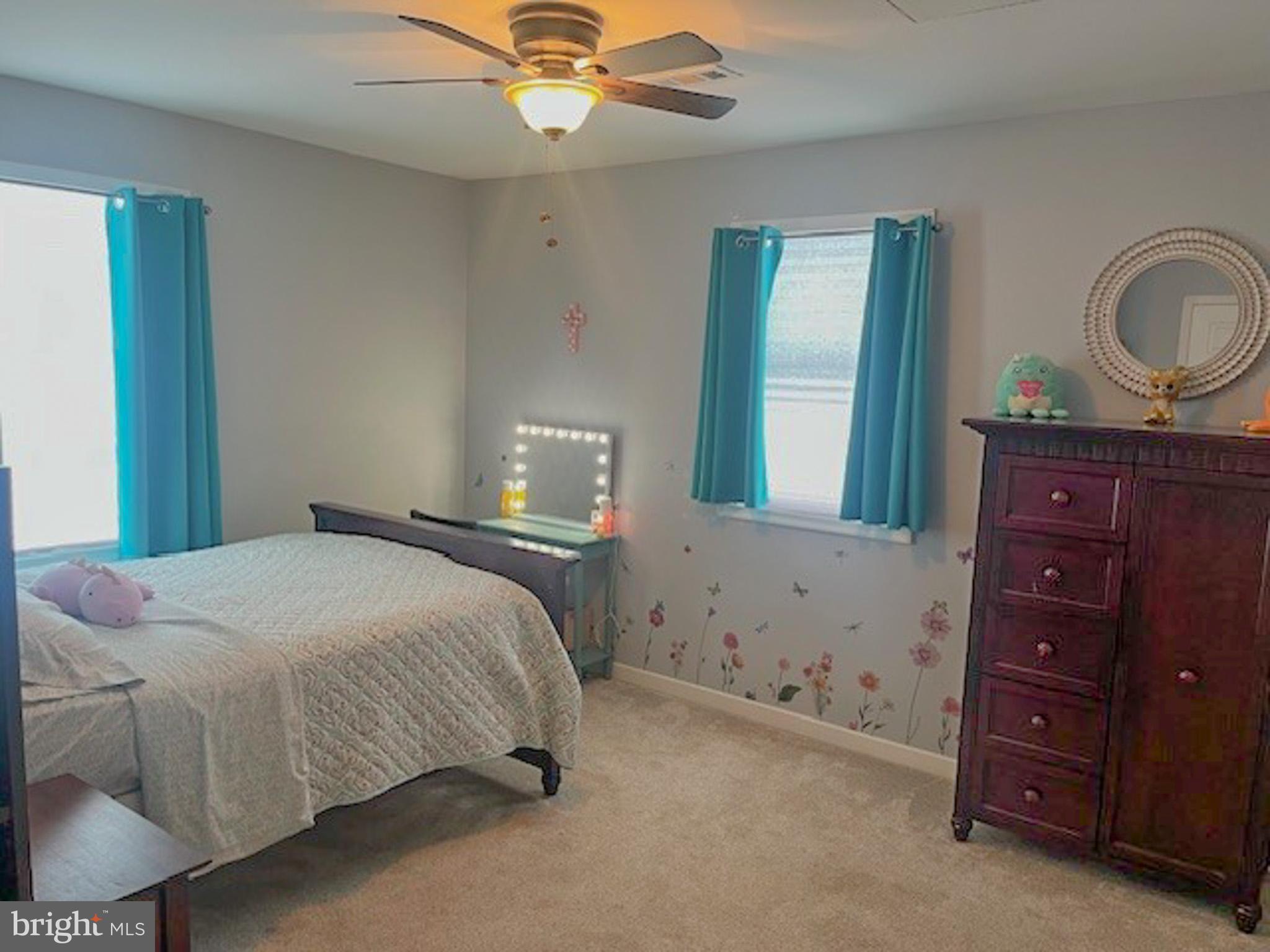 988 Kratz Road Glen Rock, PA 17327 - Photo 62 of 97 a bedroom with a bed and a dresser