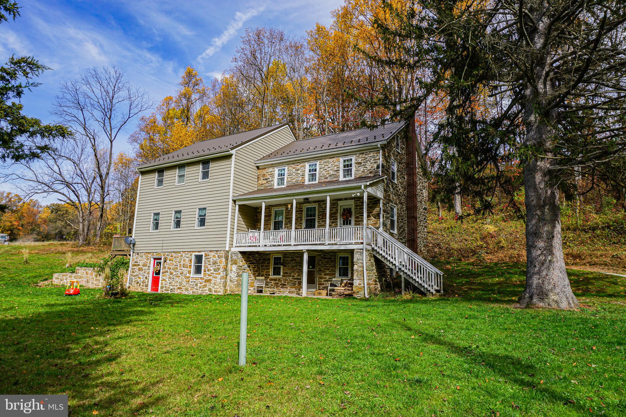 988 Kratz Road Glen Rock, PA 17327 - Photo 77 of 97 a view of a house with a big yard and large trees