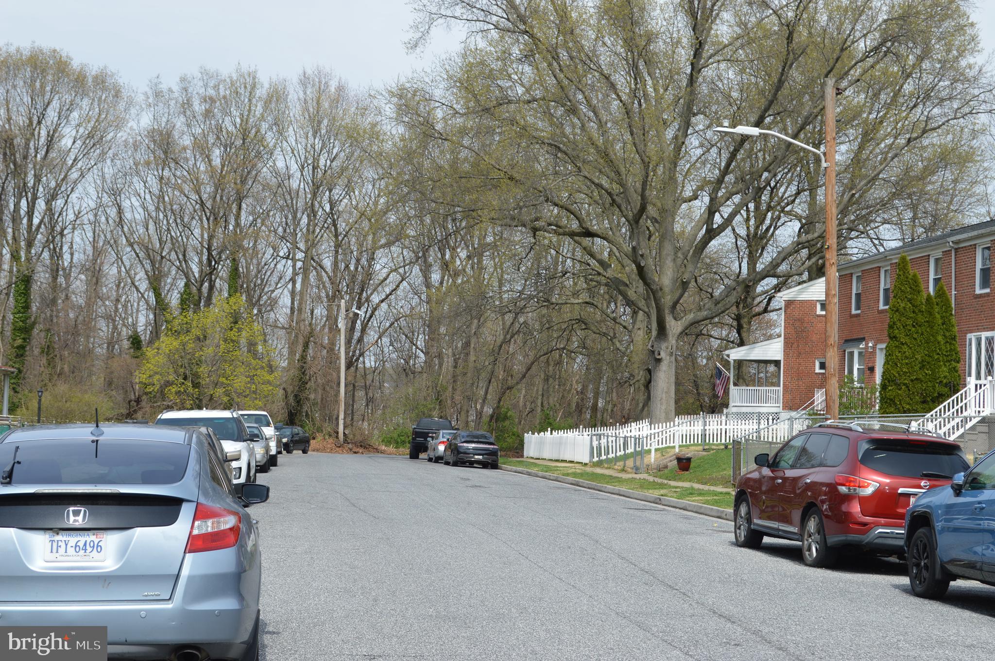 1632 Riverwood Road Baltimore, MD 21221 - Photo 26 of 32 a car parked in front of a building