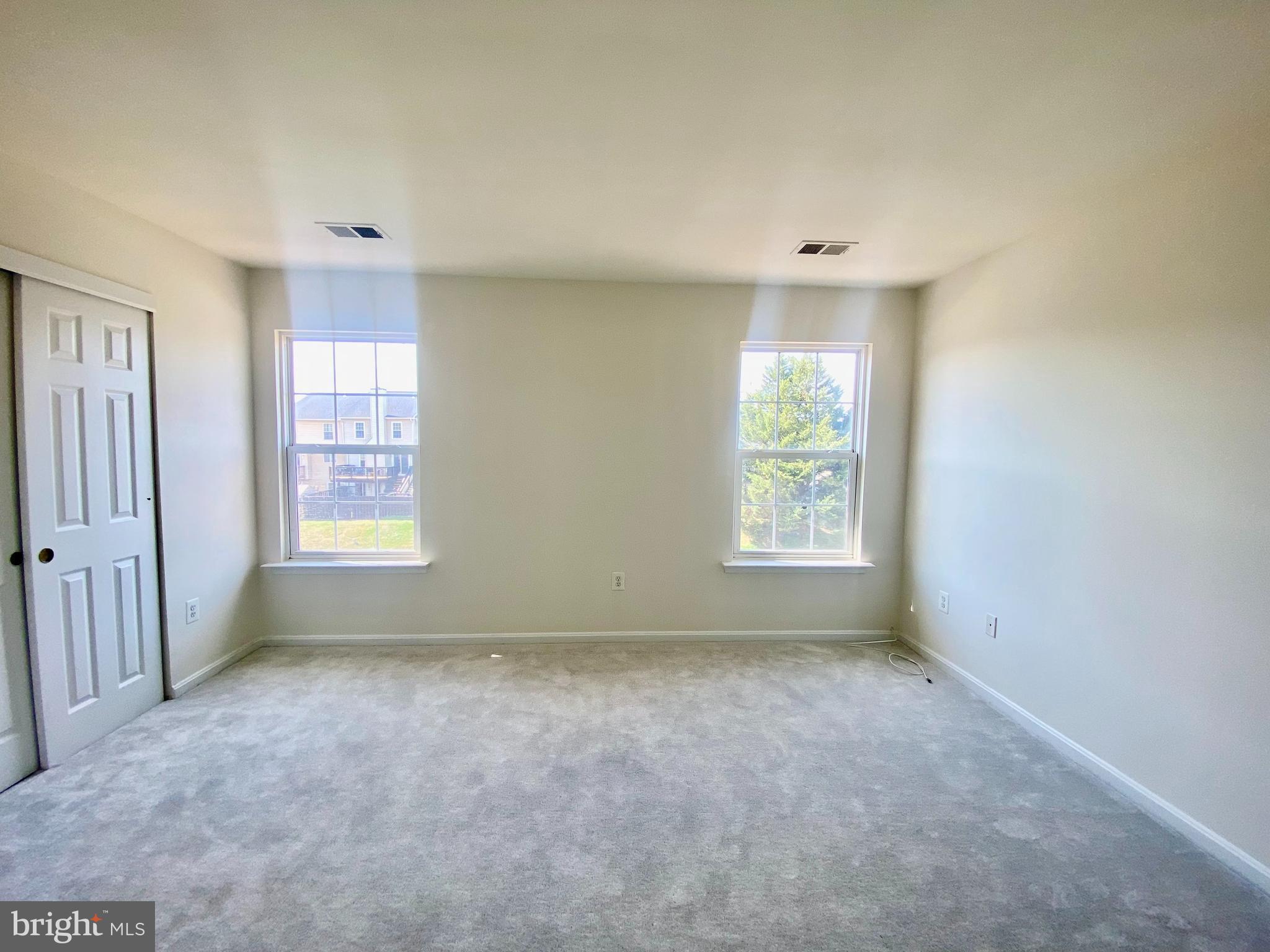 17324 Sligo Loop Dumfries, VA 22026 - Photo 11 of 39 a big room with windows and closet
