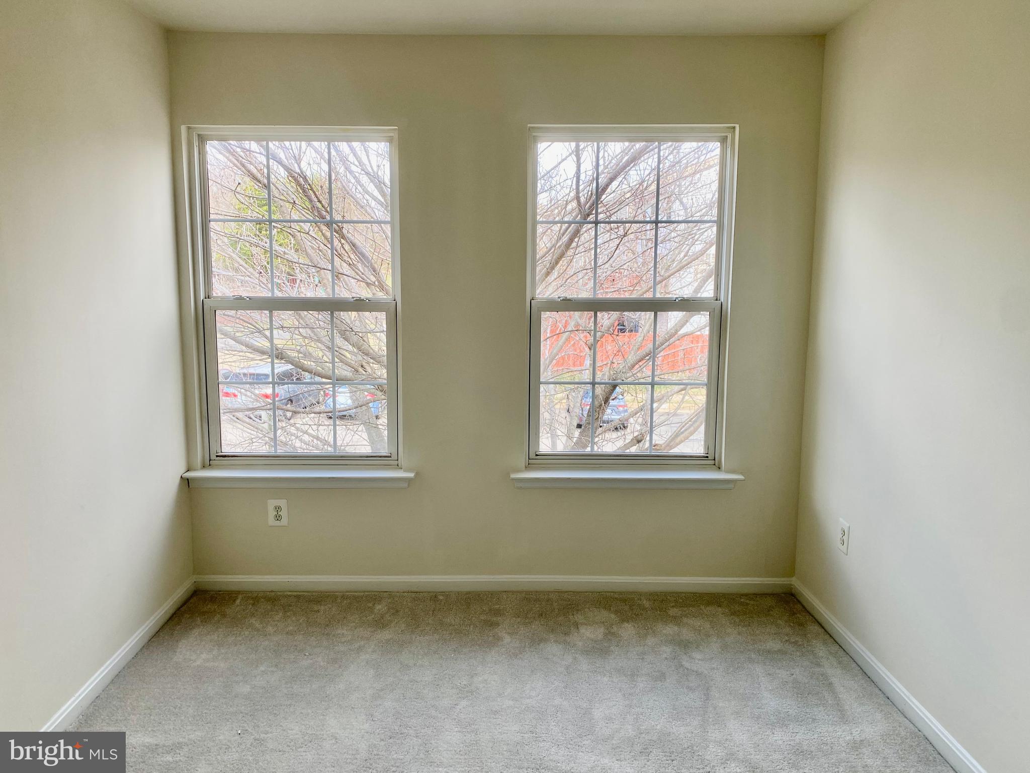 17324 Sligo Loop Dumfries, VA 22026 - Photo 12 of 39 an empty room with windows