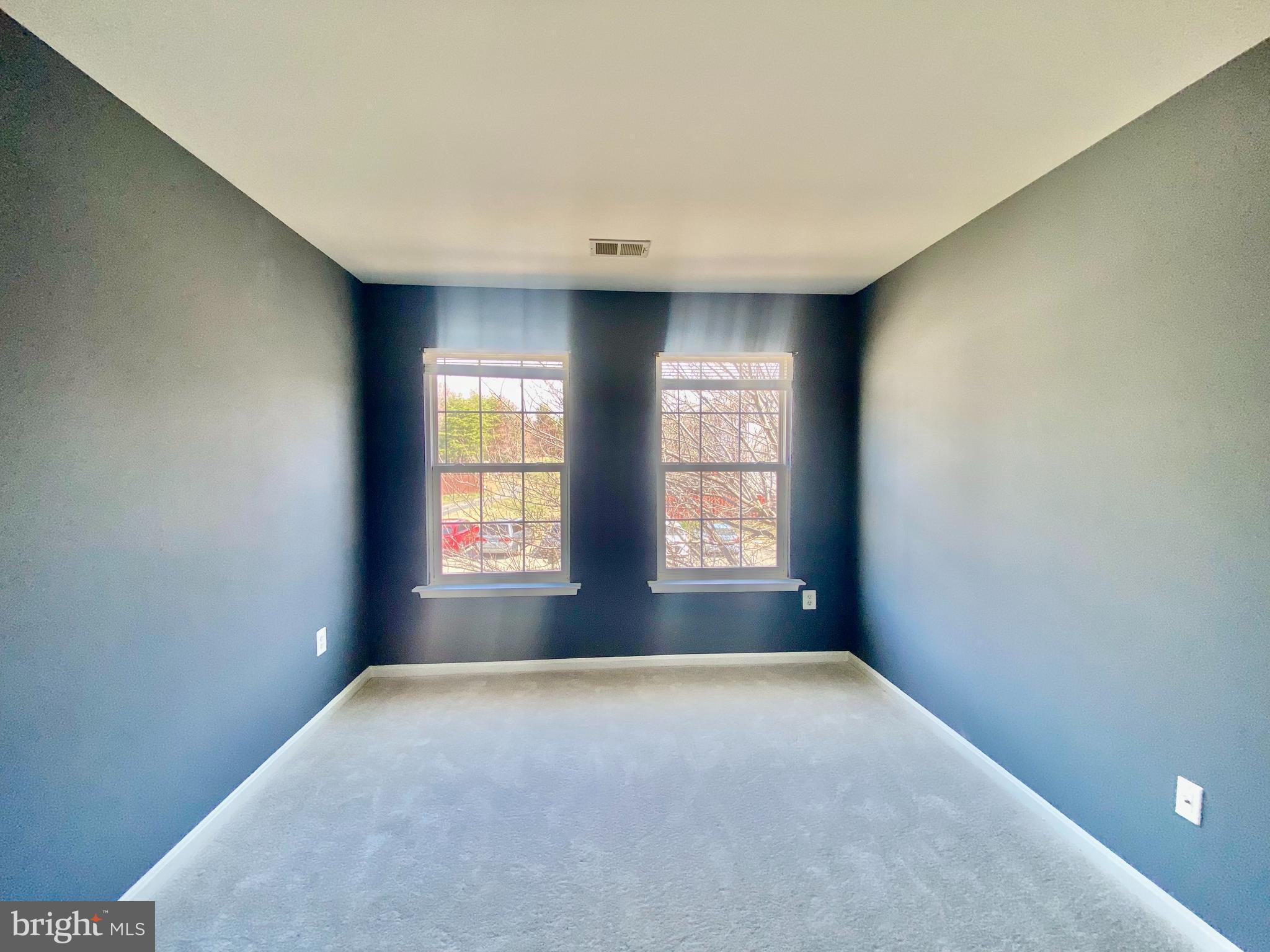 17324 Sligo Loop Dumfries, VA 22026 - Photo 14 of 39 a view of an empty room with a window