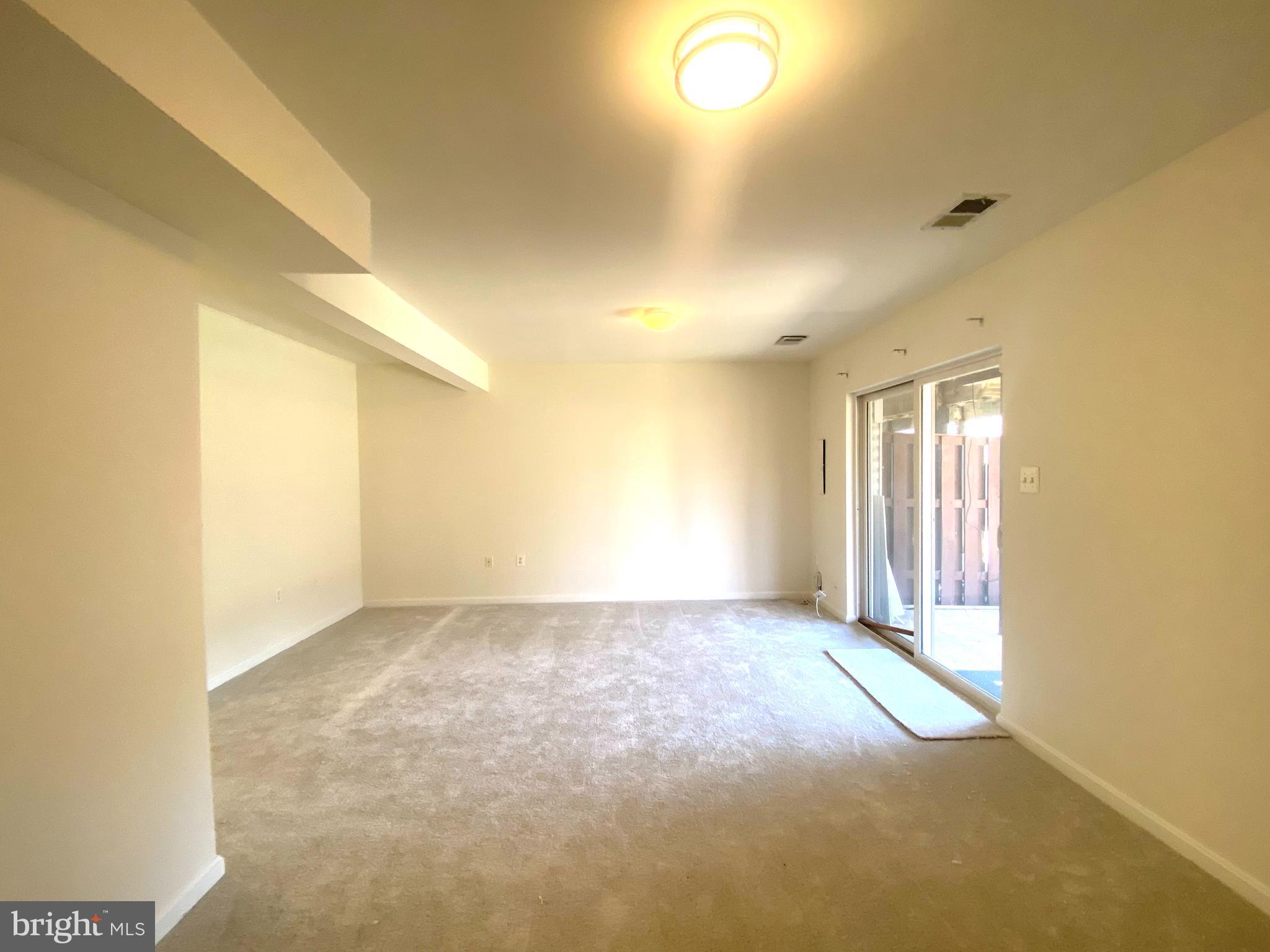 17324 Sligo Loop Dumfries, VA 22026 - Photo 19 of 39 a view of an empty room and window