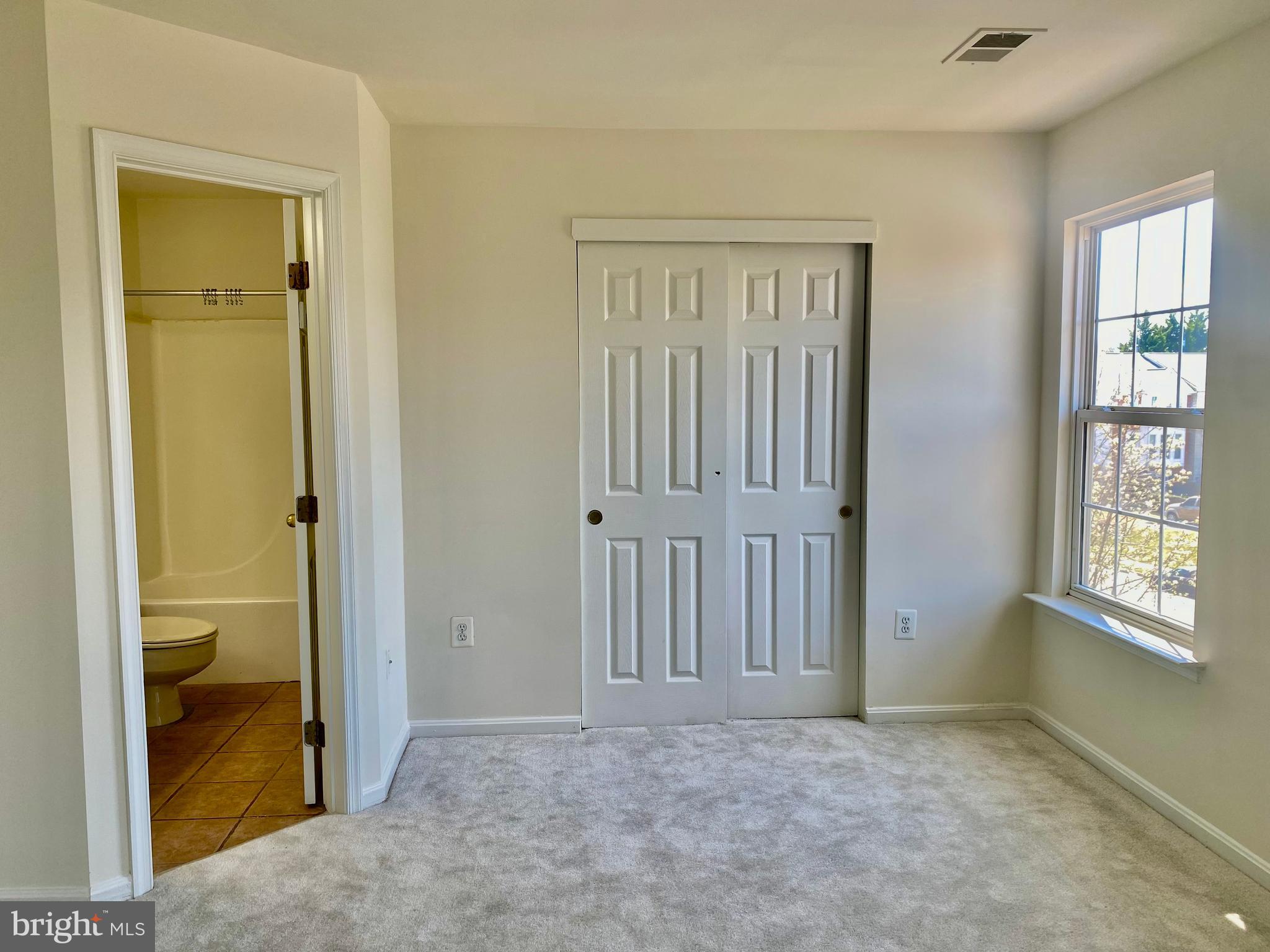17324 Sligo Loop Dumfries, VA 22026 - Photo 24 of 39 an empty room with windows
