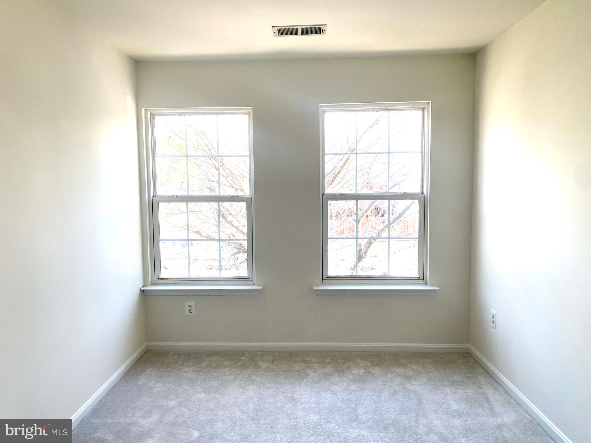 17324 Sligo Loop Dumfries, VA 22026 - Photo 26 of 39 an empty room with windows