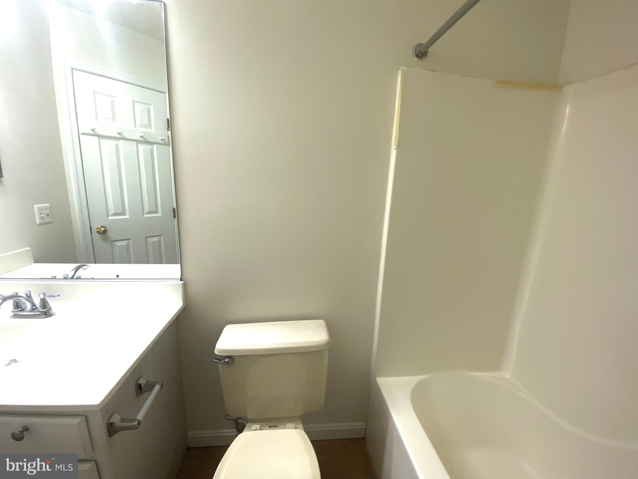 17324 Sligo Loop Dumfries, VA 22026 - Photo 32 of 39 a bathroom with a toilet a sink and bathtub