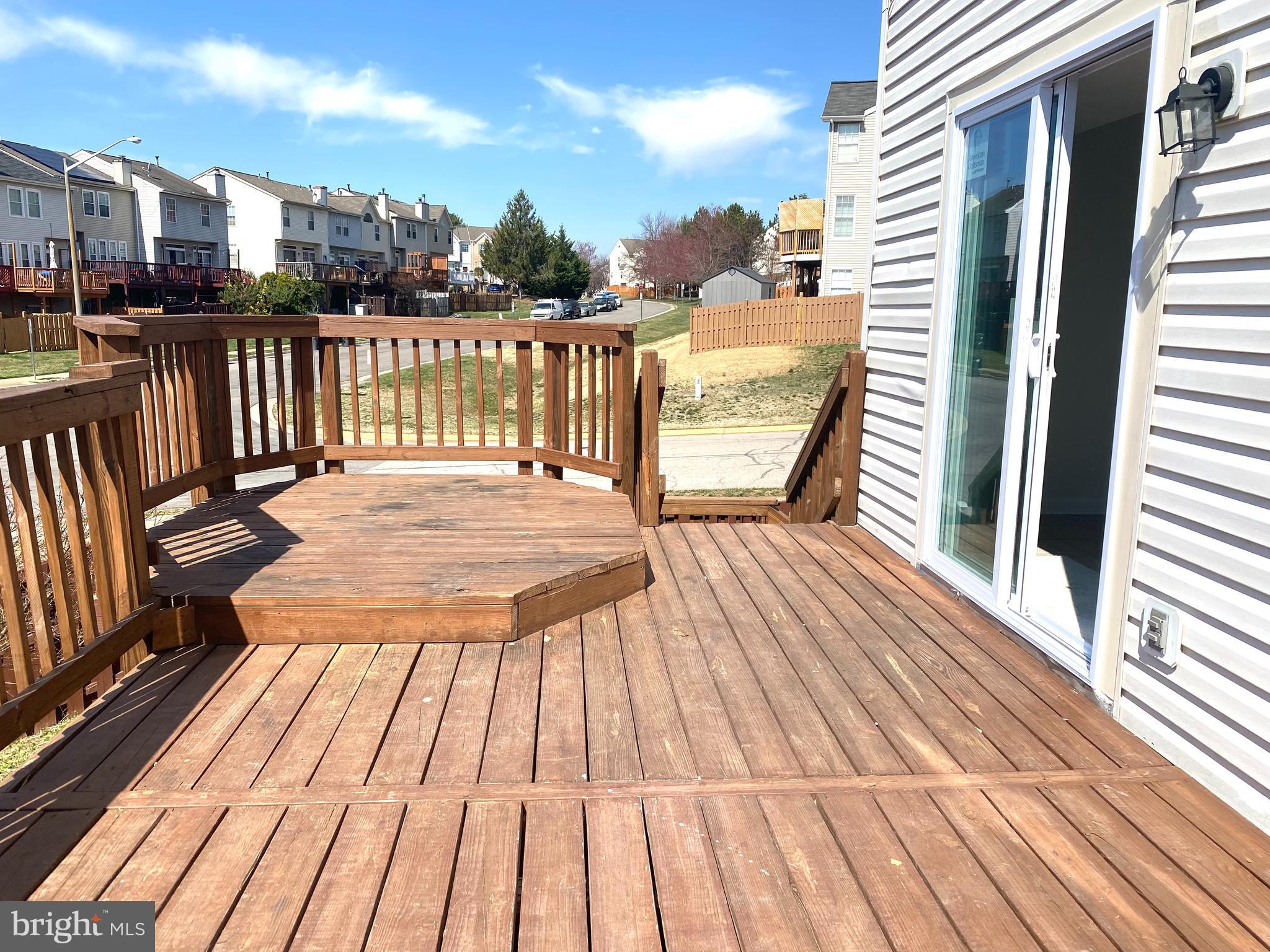17324 Sligo Loop Dumfries, VA 22026 - Photo 35 of 39 a view of balcony with wooden floor and outdoor space