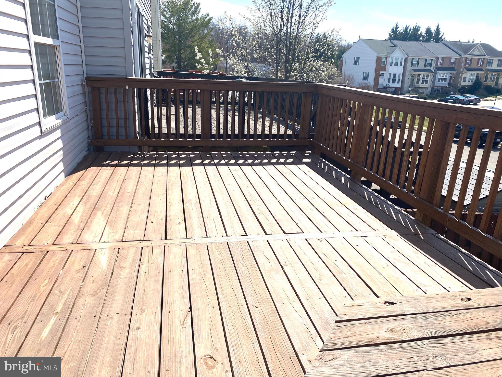 17324 Sligo Loop Dumfries, VA 22026 - Photo 36 of 39 a view of deck with city view and wooden floor