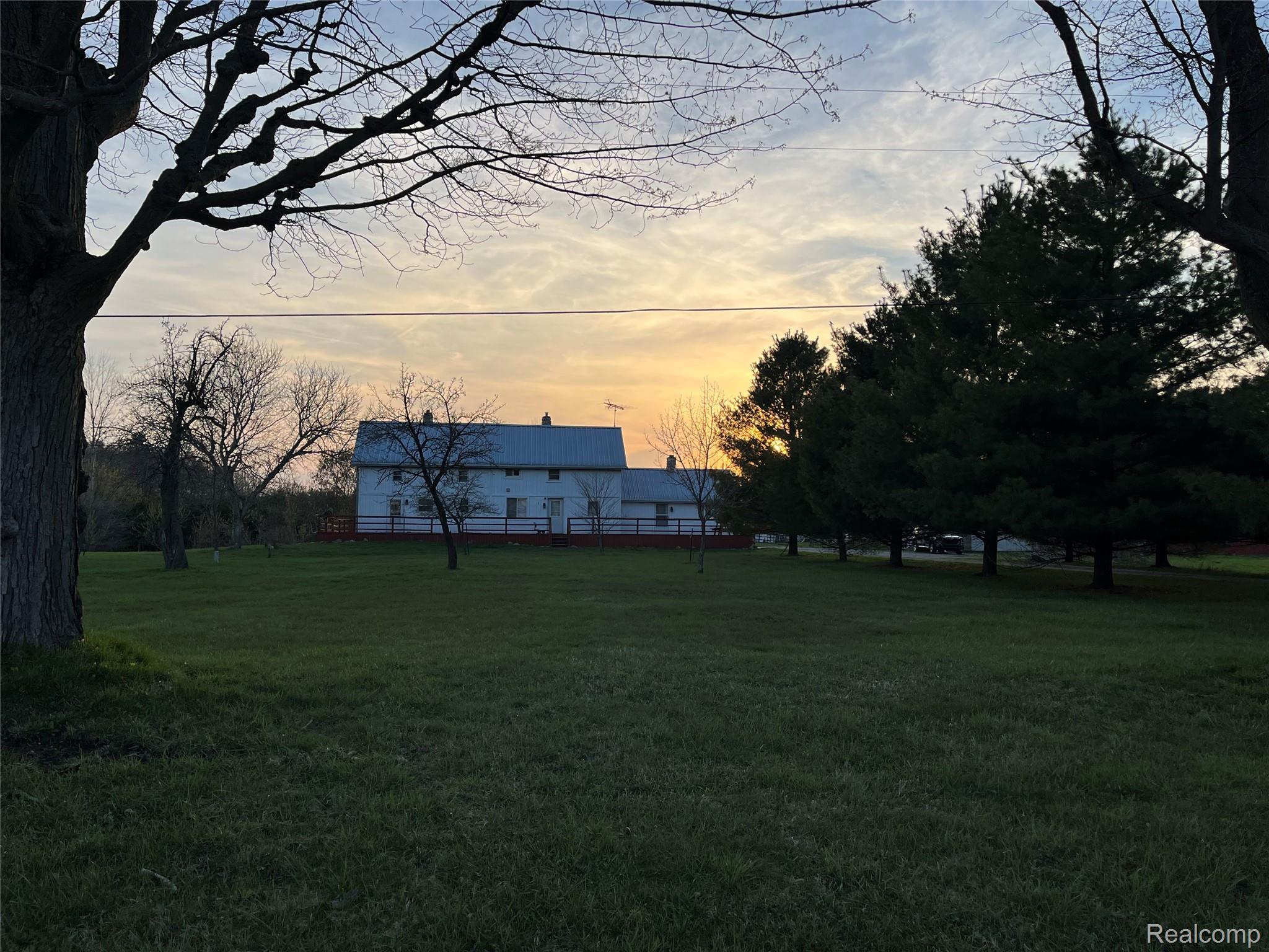 4218 Babcock Road, Unit 1 Croswell, MI 48422 - Photo 33 of 44 Yard at dusk with a yard