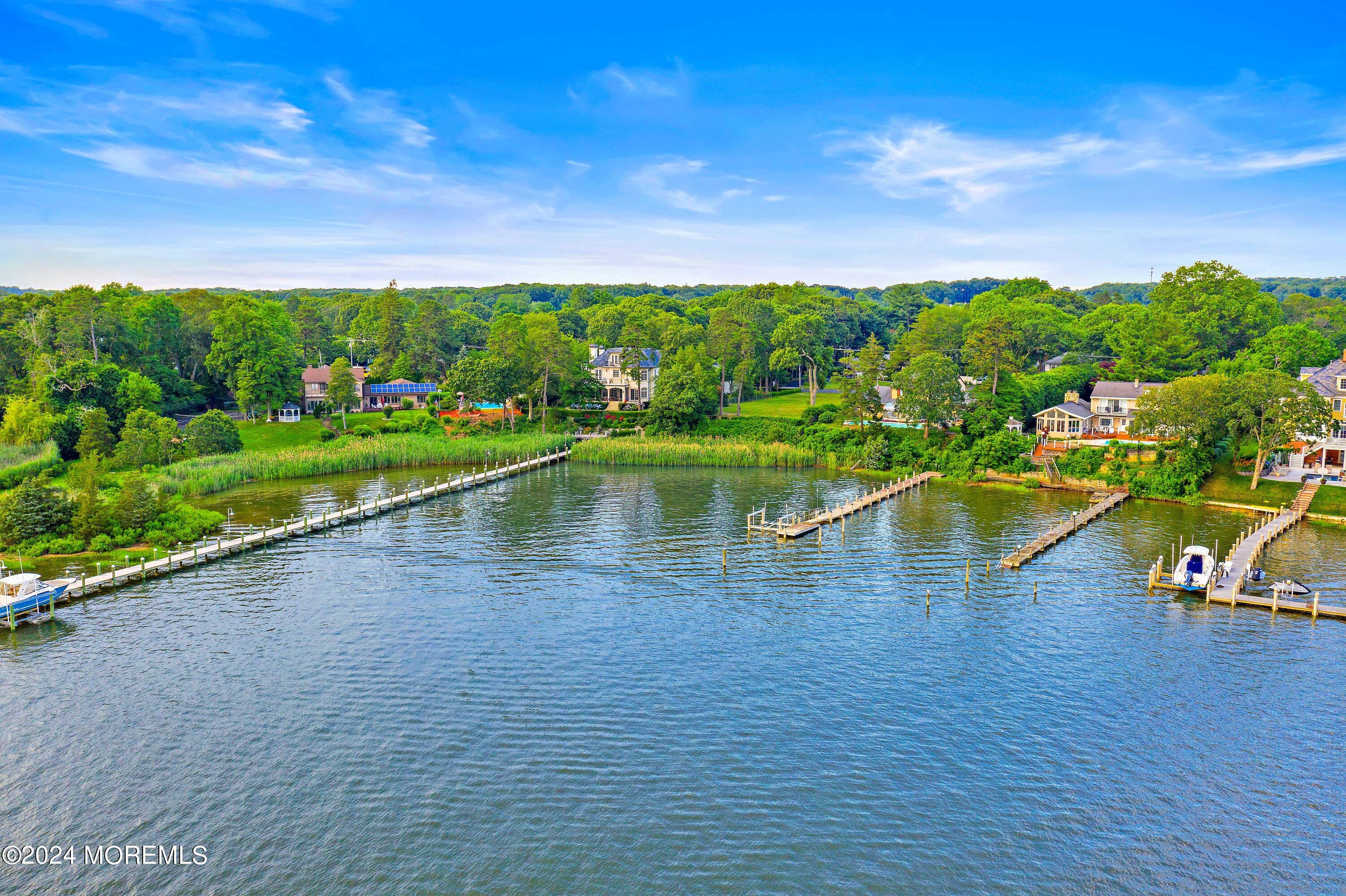 2639 River Road Manasquan, NJ 08736 - Photo 15 of 15 a view of swimming pool from a lake view